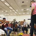 Jan Latham-Koenig rehearsing the violins
